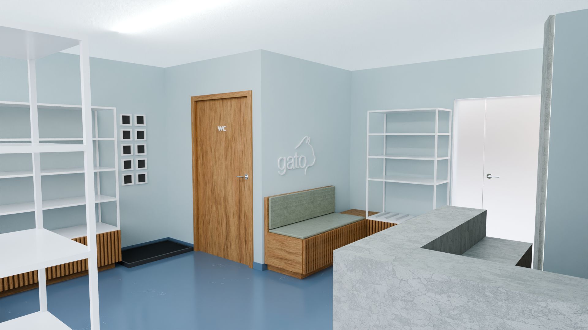 Receção da clínica All Vet Care, com paredes azul-claras, chão azul, balcão em pedra clara, estantes brancas, um banco de madeira com almofada verde e a palavra «gato» em relevo na parede junto a uma porta de WC.